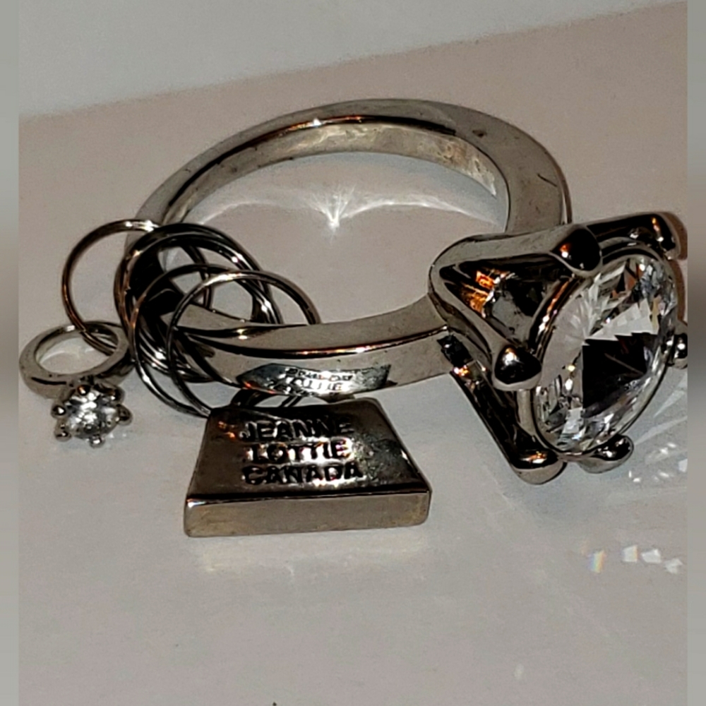Jeanne lottie giant oversize dimond ring charm.